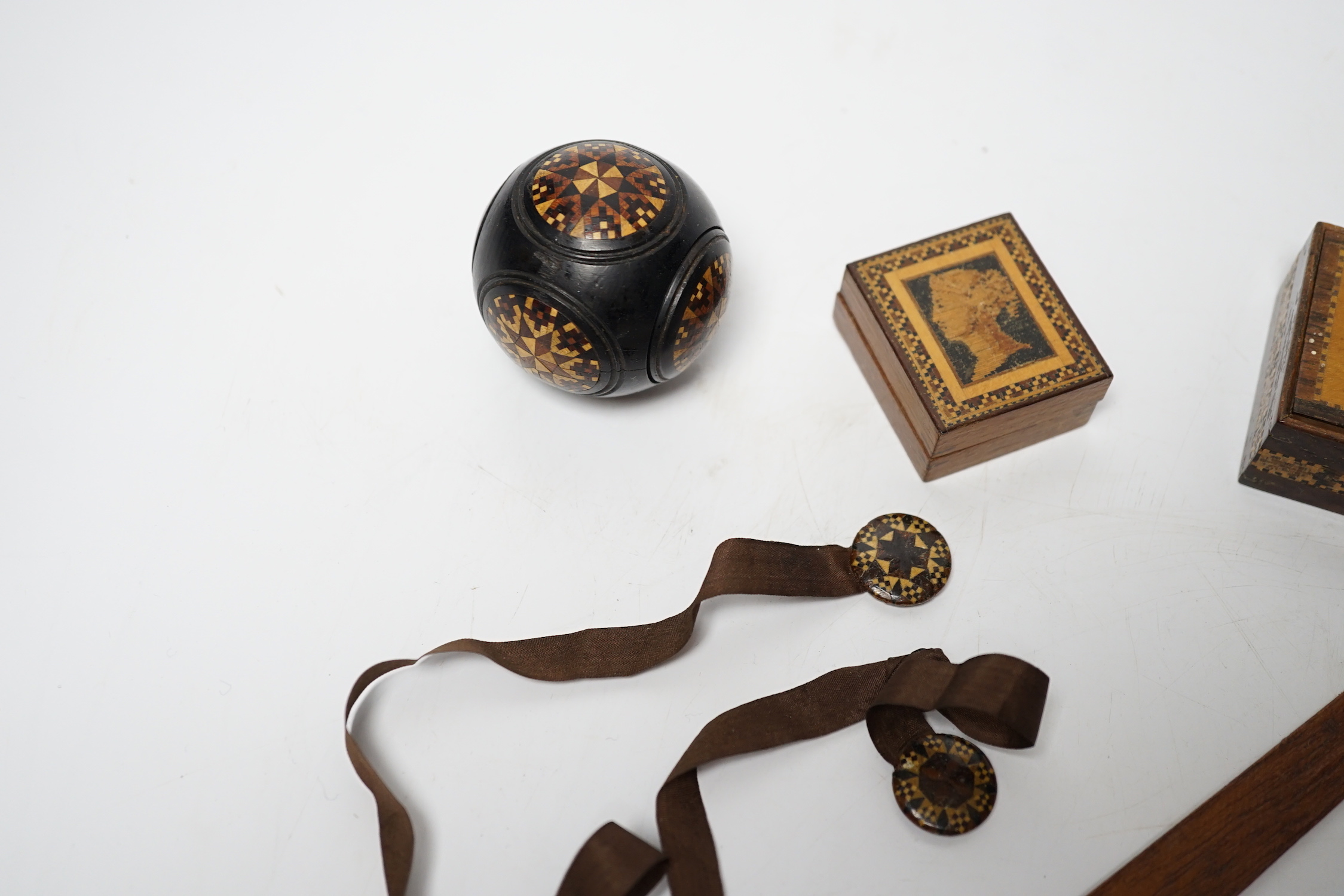 Tunbridgeware - six items including a stickware sovereign case, Victoria profile stamp box, two bookmarks, nib pen, and a small box and cover
